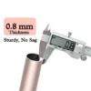 0.8 mm rose gold curtain pipe Close-up of metal curtain rod pole with highlighted text: '0.8mm thickness, sturdy and nos sag' - showcasing durable construction for long-lasting performance
