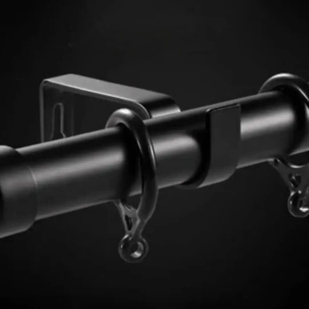 black curtain rod holders black curtain rod holders, Close-up of an elegant black curtain bracket securely holding a curtain rod, showcasing its sleek design and sturdy construction for flawless drapery support
