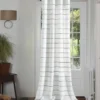 curtain pole for window against wall curtain pole for window against wall - Elegant floor-length curtains hanging on a matte black curtain rod mounted on a wall-adjacent door. Showcases space-saving design with sturdy brackets and seamless fabric drape