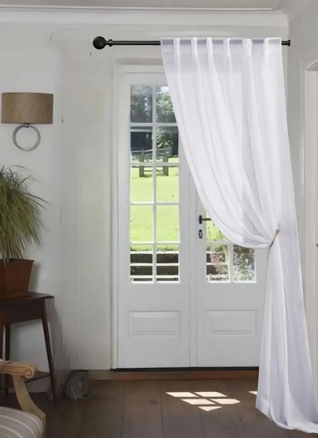 curtain pole for window close to wall curtain rods for windows close to wall - Elegant floor-length curtains hanging on a matte black curtain rod mounted on a wall-adjacent door. Showcases space-saving design with sturdy brackets and seamless fabric drape