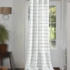 curtain rod close to wall curtain rod close to wall - Elegant floor-length curtains hanging on a matte black curtain rod mounted on a wall-adjacent door. Showcases space-saving design with sturdy brackets and seamless fabric drape