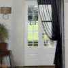 curtain rod against wall curtain rod against wall - Elegant floor-length curtains hanging on a matte black curtain rod mounted on a wall-adjacent door. Showcases space-saving design with sturdy brackets and seamless fabric drape