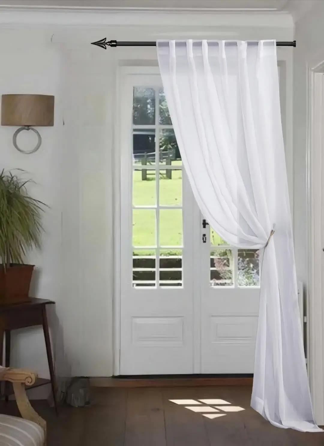 curtain rod next to wall curtain rod next to wall - Elegant floor-length curtains hanging on a matte black curtain rod mounted on a wall-adjacent door. Showcases space-saving design with sturdy brackets and seamless fabric drape