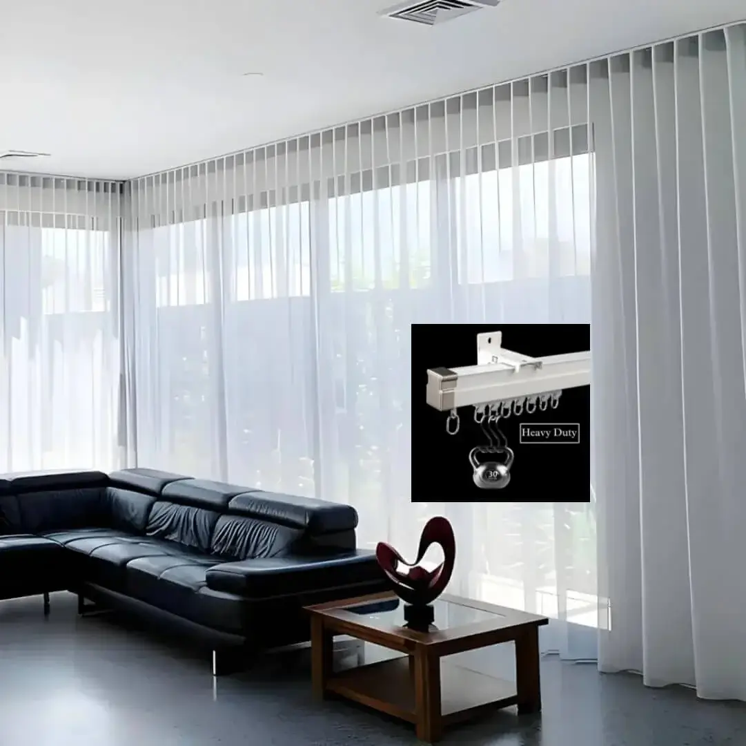 curtain track for living room curtain hanging from a curtain track which is installed on a living room window, creating a chick and inviting ambience.