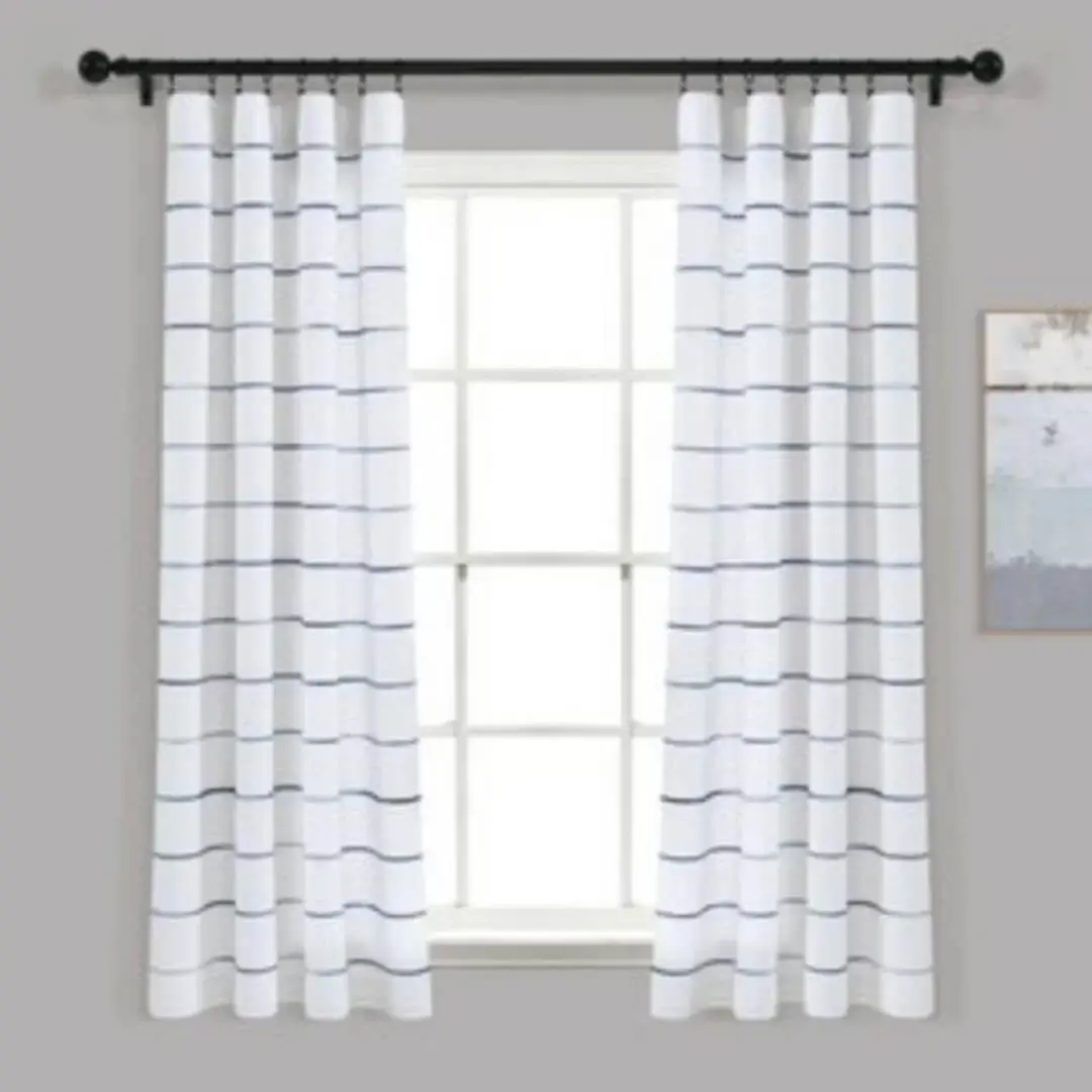 curtain rods for windows curtain rods for rooms - Elegant checks curtain gracefully hanging from a sleek black curtain rod installed on a bedroom window, creating an airy and sophisticated look