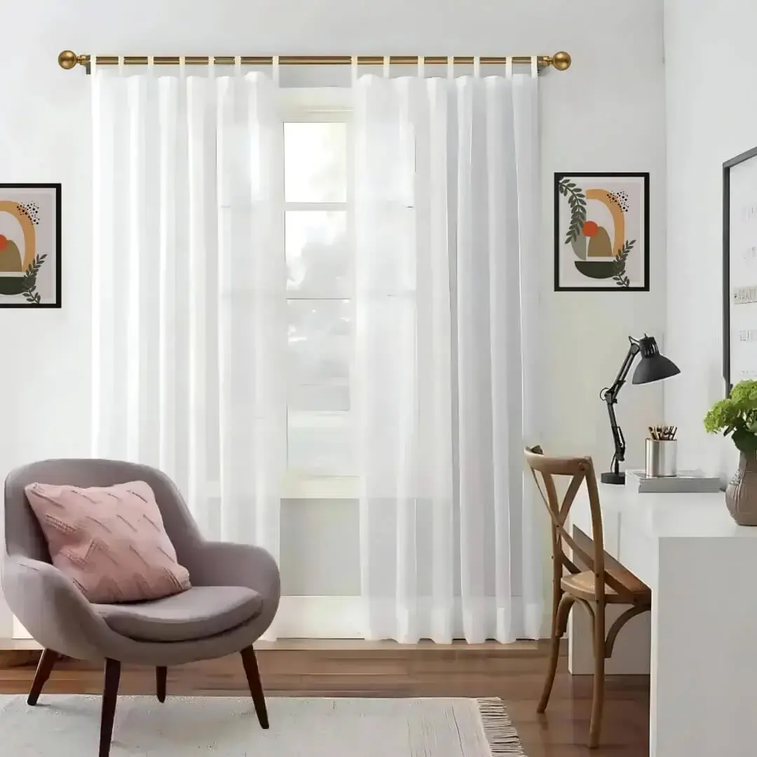 gold curtain pole for living room gold curtain pole for living room -, Elegant pleated sheer curtain gracefully hanging from a luxurious gold curtain rod with ball finial installed on a window in a living room, creating an airy and sophisticated look