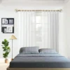 antique gold curtain rod set for bedroom antique gold curtain rod set for bedroom - Elegant sheer curtains cascading from a luxurious gold curtain rod in a stylish bedroom, featuring a cot, wall painting, side lamp, and potted plant—creating a bright, airy, and sophisticated ambiance