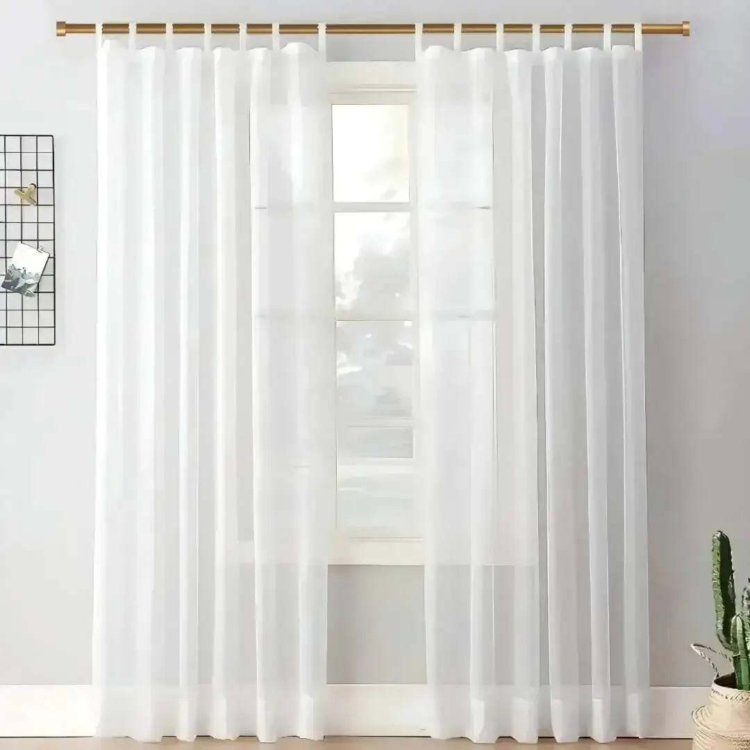 curtain rod for window curtain rod for window - Elegant sheer curtain gracefully hanging from a luxurious gold curtain rod installed on a small window, creating an airy and sophisticated look