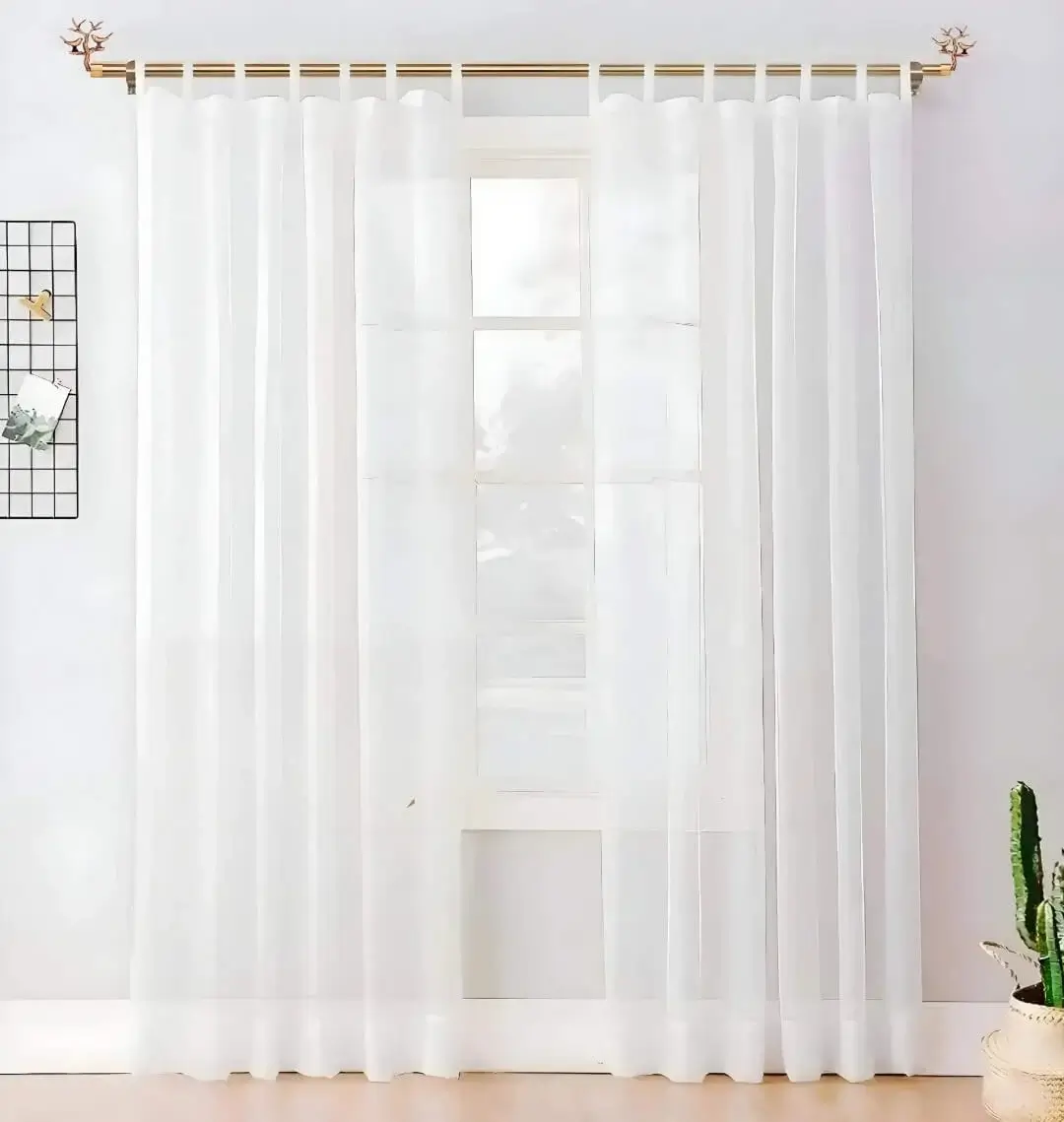 adjustable gold curtain pole set for living room adjustable gold curtain pole set for living room - Elegant living room with grommet voile sheer curtains hanging on a sturdy, adjustable gold curtain rod set. Creates a chic and inviting ambiance with a perfect window treatment.