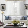 gold curtain pole set for living room gold curtain pole set for living room - Stylish living room with flowing curtains on a 12 feet long gold curtain rod set, paired with a cozy sofa set, vibrant cushions, and wall paintings—creating a chic, inviting ambiance. Text highlight:12 feet curtain rod