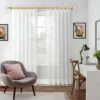 adjustable curtain rod for living room adjustable curtain rod for living room - showcase: Elegant sheer curtains hanging from a sturdy gold curtain rod with crystal ends in a cozy living room, paired with a modern single-seater sofa, wooden study table, and decorative wall painting for a stylish home decor setup