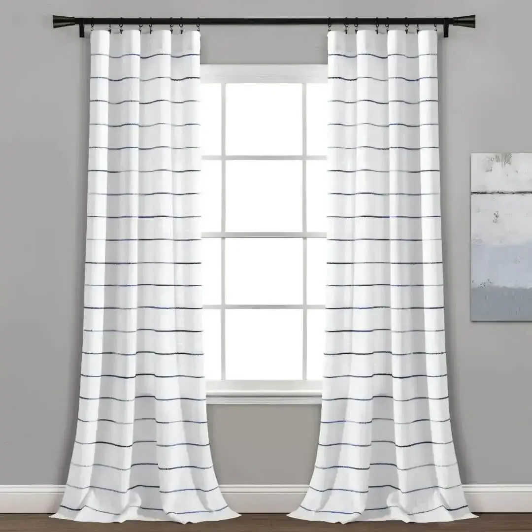 curtain rods for living room curtain rods for living room - Stylish living room with flowing curtains on a black curtain rod, installed on a window, paired with cushions and wall painting —creating a chic, inviting ambiance.
