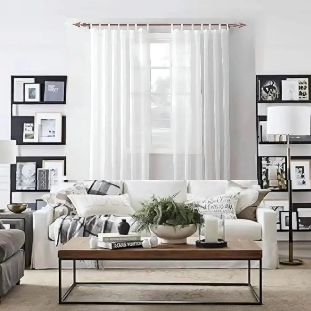 rose-gold-curtain-rods-in-living-room.webp
