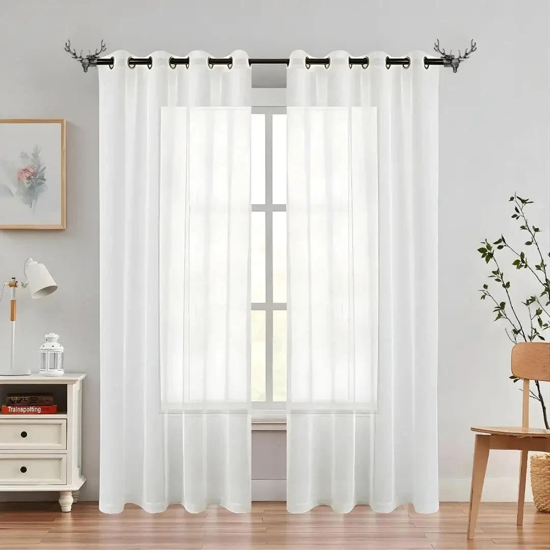 curtain rod and accessories for living room curtain rod and accessories for living room - Elegant sheer curtain gracefully hanging from a matte black curtain rod with deer finial installed on a living room window, creating an airy and sophisticated look