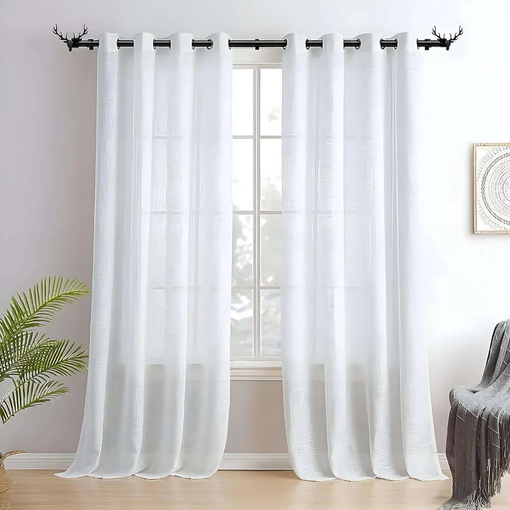 curtain rod and brackets for living room curtain rod and brackets for living room - Elegant sheer curtain gracefully hanging from a matte black curtain rod with deer finial installed on a living room window, creating an airy and sophisticated look