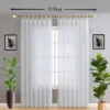 12 feet adjustable curtain rods 12 feet adjustable curtain rod - A stylish living room featuring flowing sheer curtains on an adjustable 12-foot (144-inch) gold curtain rod. The setup is complemented by wall art and decorative potted plants, creating a chic and inviting ambiance. Text highlight: '12-foot'.