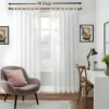 14 feet long adjustable curtain rod set 14 feet long adjustable curtain rod set - showcase: Stylish living room with flowing curtains on a gold curtain rod, paired with a single seater, and a table —creating a chic, inviting ambiance