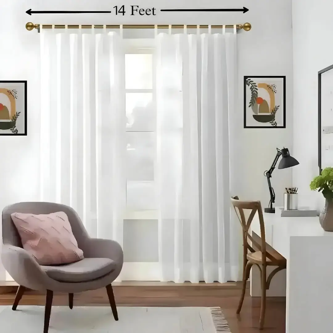 14 feet long adjustable curtain rod set 14 feet long adjustable curtain rod set - showcase: Stylish living room with flowing curtains on a gold curtain rod, paired with a single seater, and a table —creating a chic, inviting ambiance